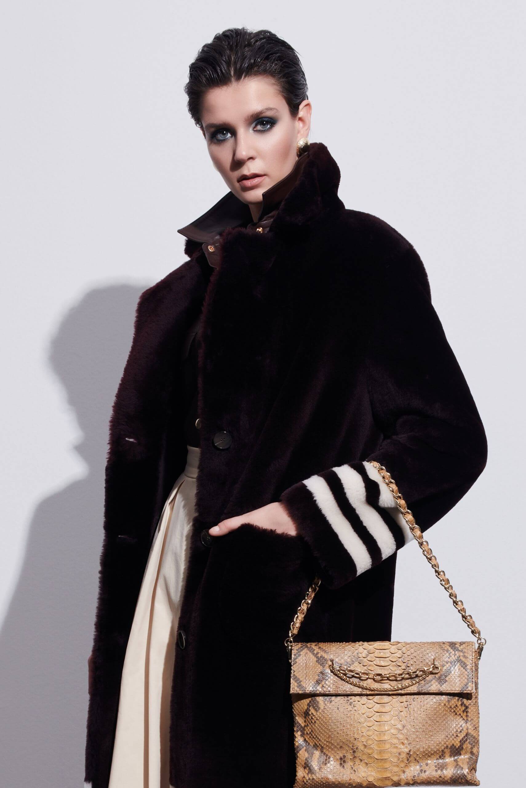 Black long fur coat displayed in an Istanbul boutique – part of a luxury shopping guide for fur fashion.