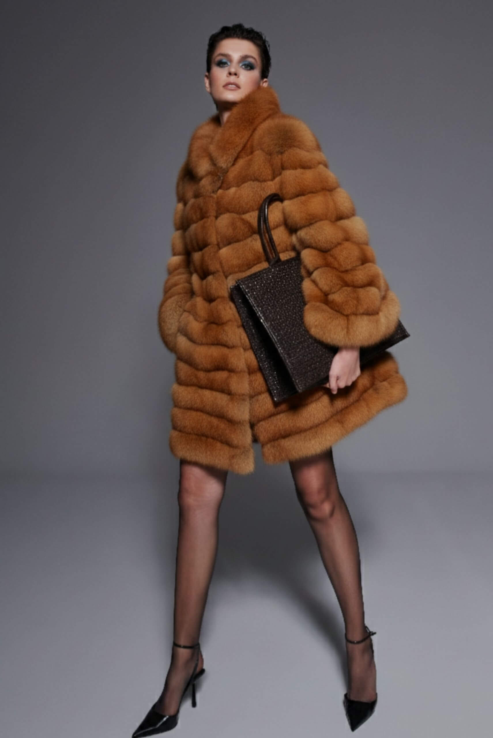 Cinnamon orange fur coat displayed in an Istanbul boutique – part of a luxury shopping guide for fur fashion.