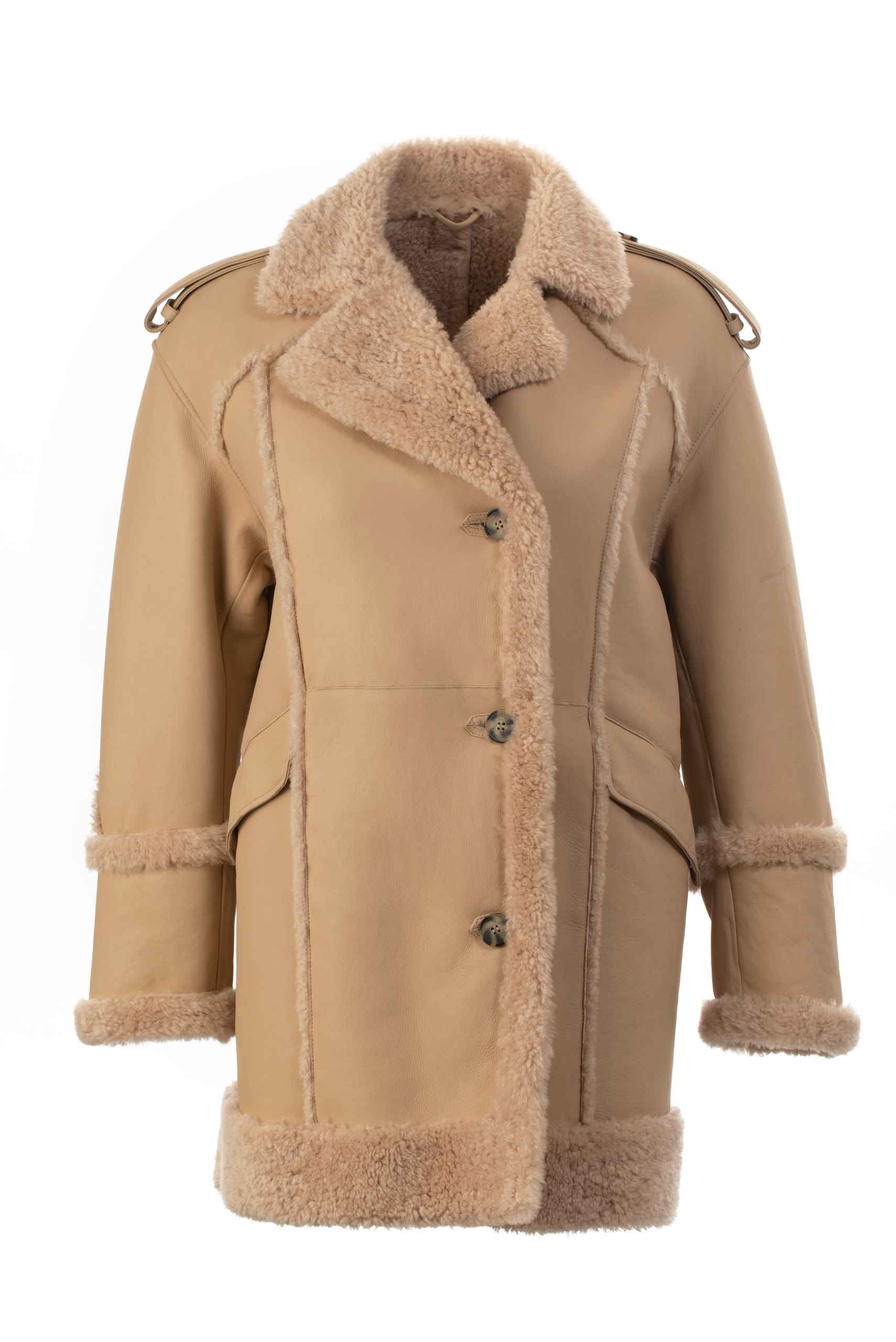 Camel shearling coat for women — handcrafted from genuine sheepskin, combining natural warmth, elegance, and timeless winter style.