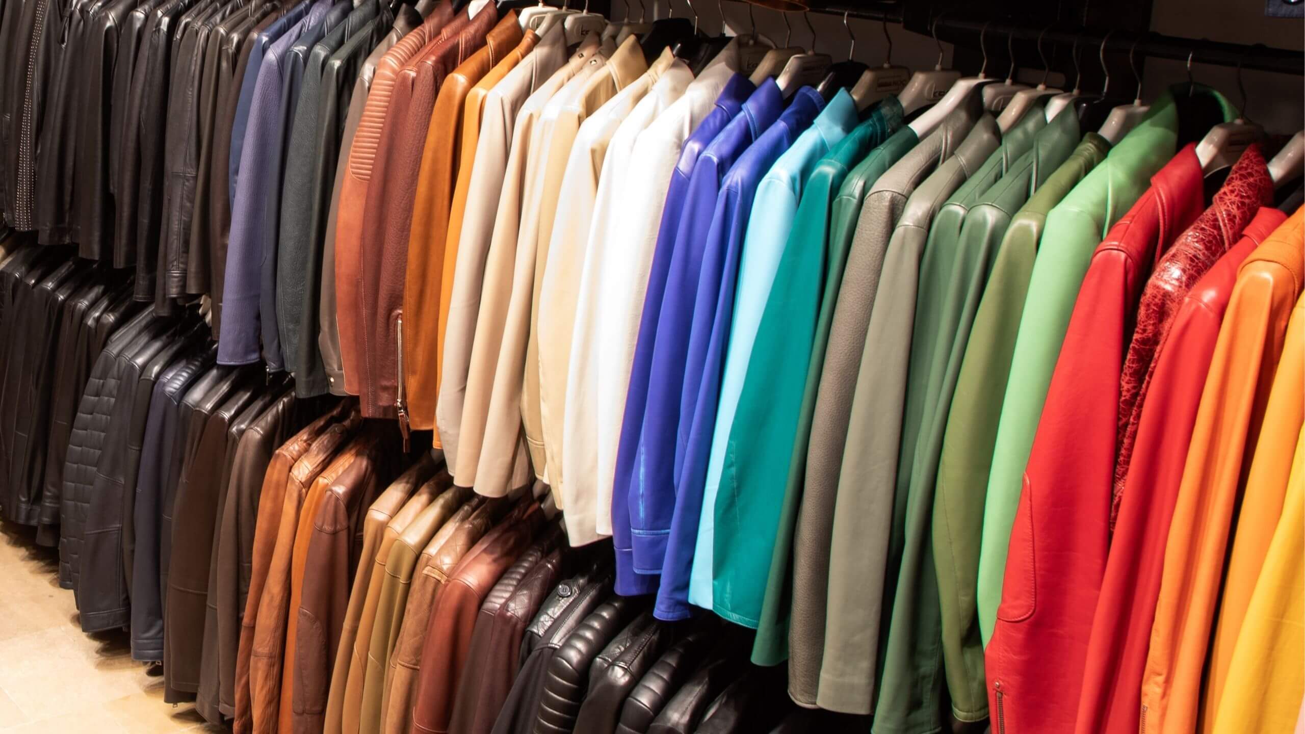 Colorful leather jackets displayed in a Grand Bazaar Istanbul store showcasing variety and quality options for shoppers