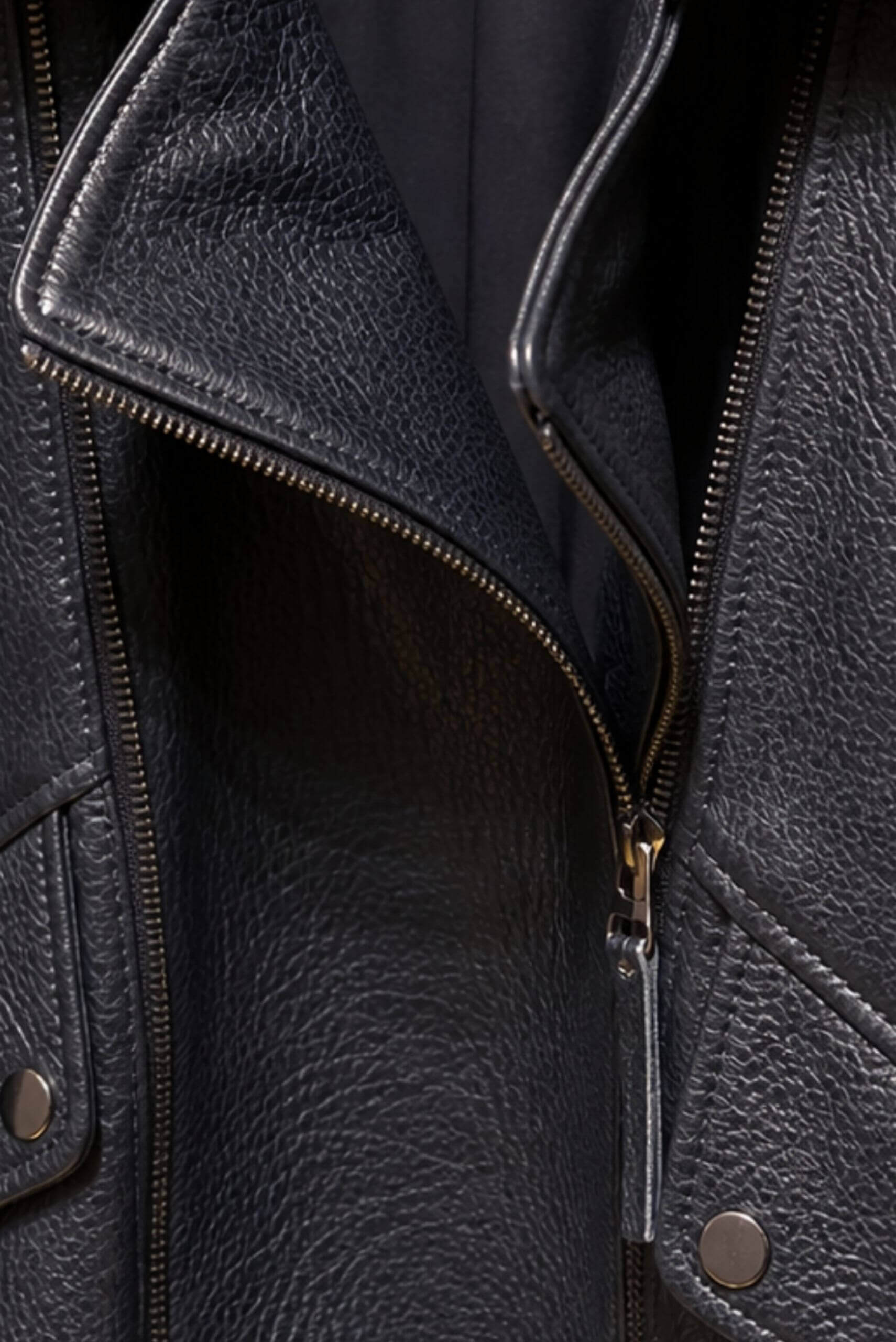 Close-up of premium leather jacket showing texture, stitching, and zipper quality in Istanbul leather craftsmanship